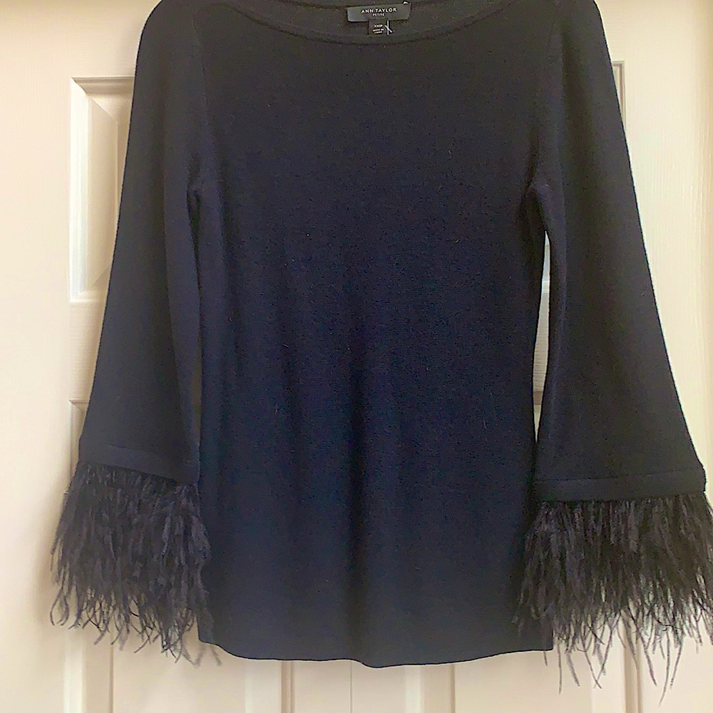 Ann Taylor black knit top with feather trimmed sleeves